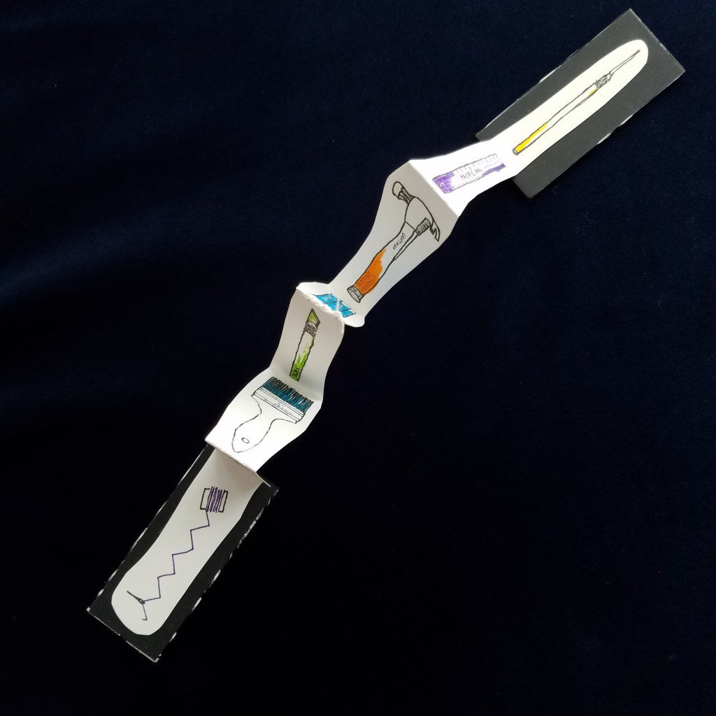 Small accordion book is laid open to show drawings of an awl, ruler, hammer, xacto knife, brush, and needle and thread.